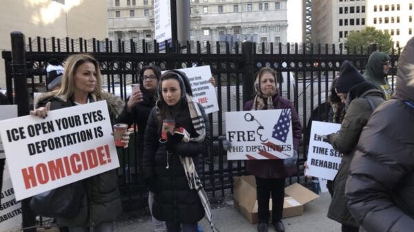 protesters outside U.S. District Court on the day of Iraqi deportation case hearing