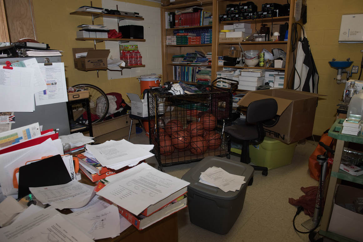 The high-school chemistry teacher, who doubles as the Rudyard basketball coach, says he's forced to keep basketballs in a closet in the chemistry classroom because of a lack of storage space.