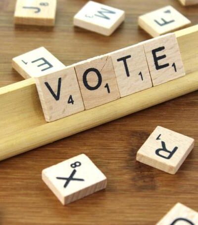 vote spelled with game tiles