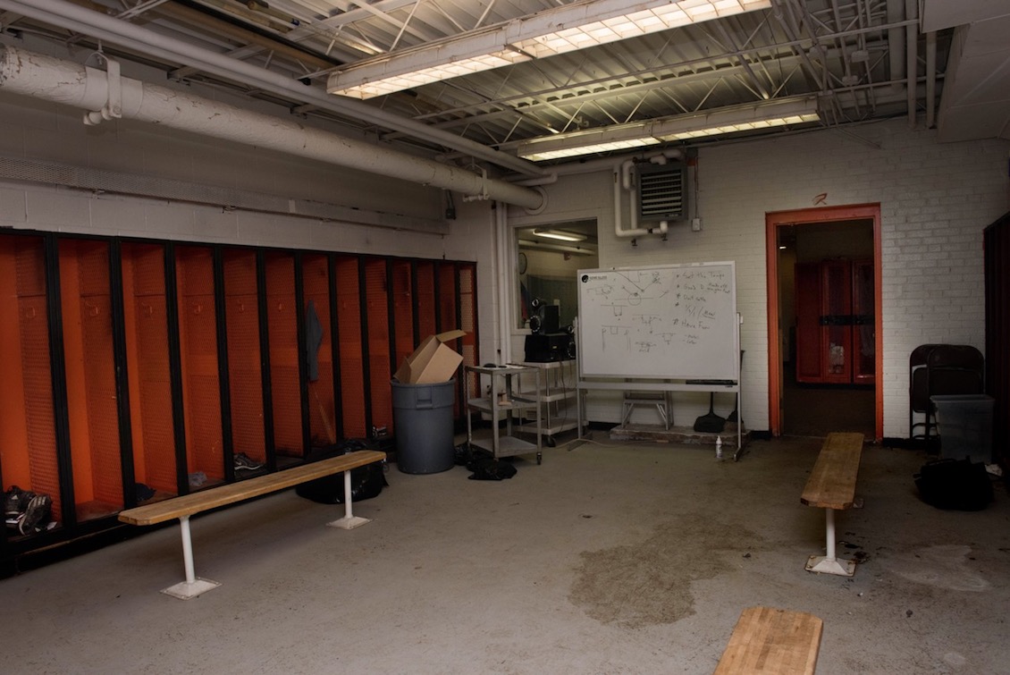 The high-school boys' locker room is in desperate need of renovation.