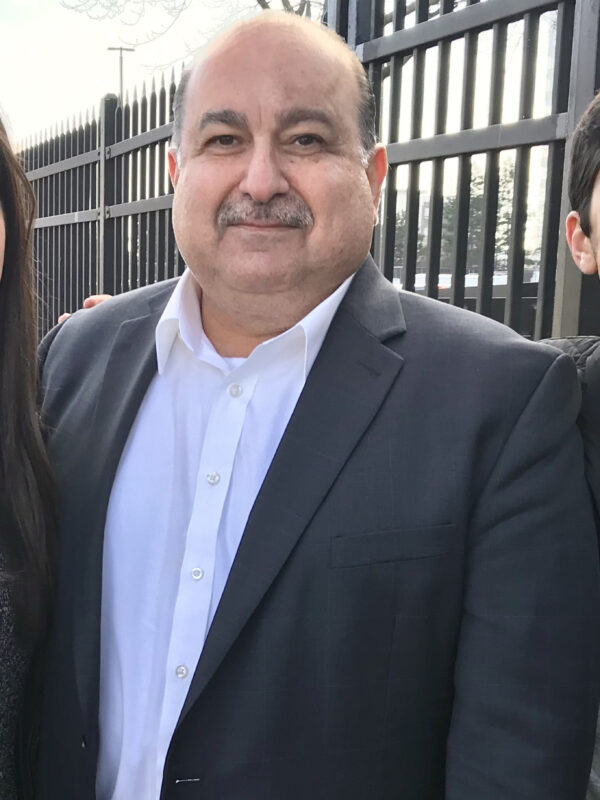 Sam, Brittany and Chris Hamama standing together in Detroit