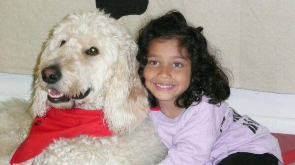 Ehlena Fry and her service dog Wonder