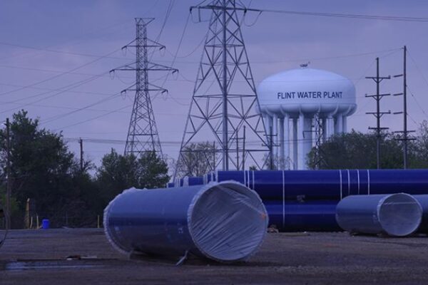 Wide picture of Flint water tower and plant