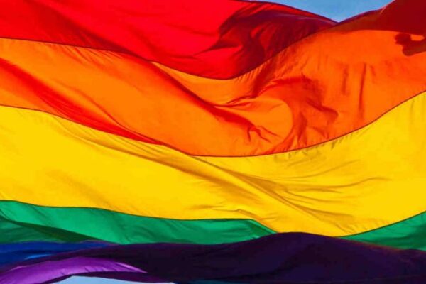 Flag waving with rainbow colors