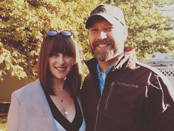 Rachel Peterson pictured standing with her husband.