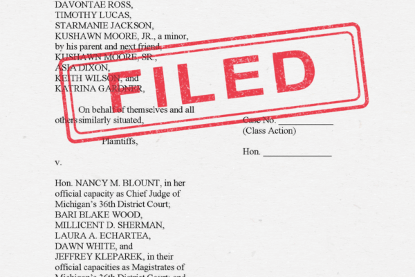First page of lawsuit with filed stamp in red