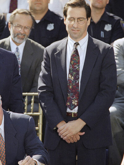 President Bill Clinton signs the $30 billion crime bill during a ceremony on the South Lawn of the White House in Washington on Sept. 13, 1994