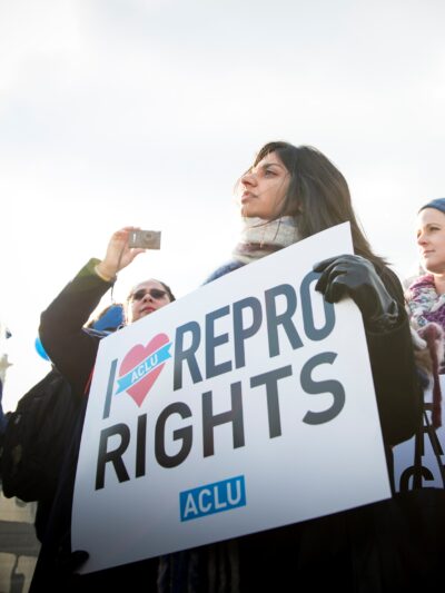 Activist protesting for reproductive rights at the Supreme Court