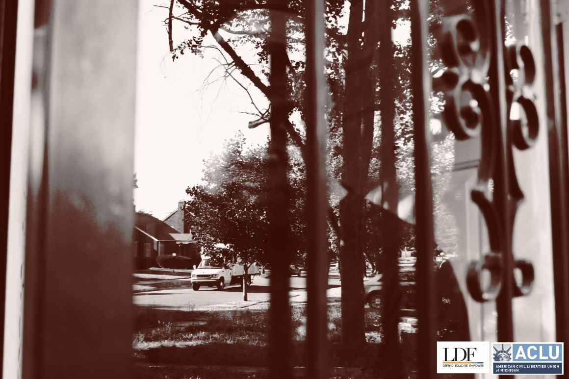 The reflection of the street in the glass of Walter Hick's front door. 