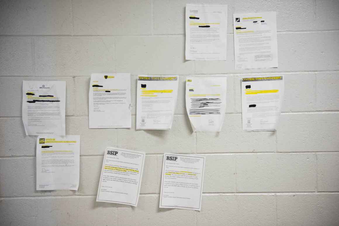 Because bulletin board space at Beecher High School is precious, students' college acceptance letters adorn the school's cinder-block walls.