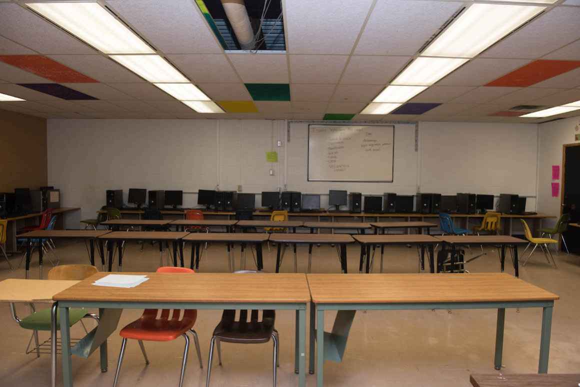 One of the school's computer labs--a large room with no windows, the problem is not the shortage of computers purchased with federal grant money. The issue is a hot climate. 