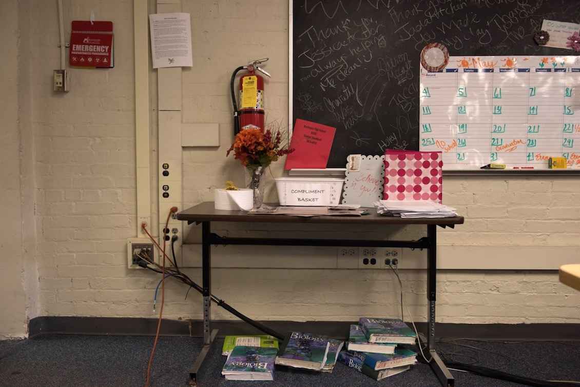 In basement classrooms, brick walls impede attempts to install new electrical wiring. The district also lacks the funds to convert all of the blackboards in its classrooms to dry-erase boards.