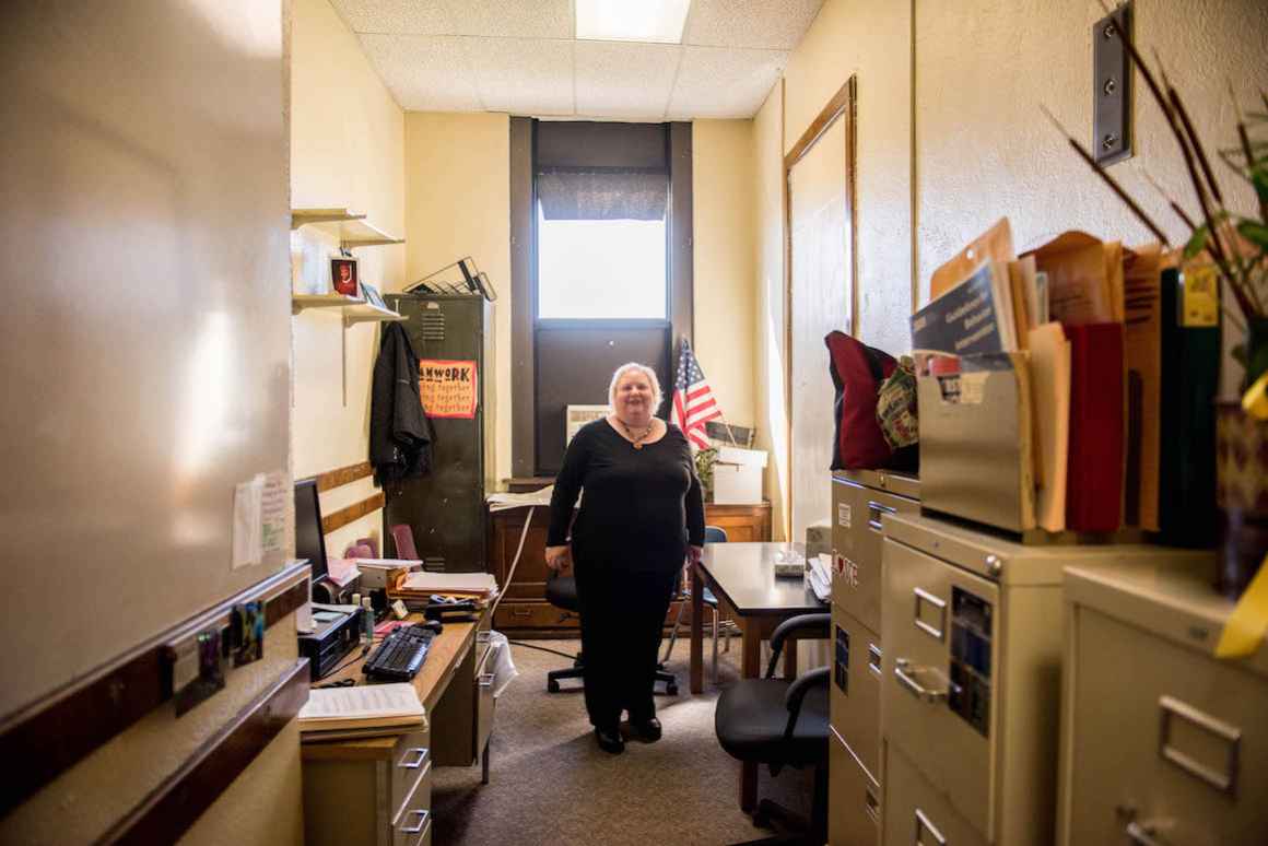 Janice Gandelman makes due with her office, a converted coat closet, at Dickinson West Elementary.