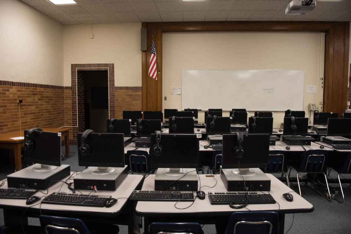 Nelson Elementary School's computer lab was built by transforming the school's old auditorium. Sweltering temperatures inside the school, stemming from the school's outdated heating system, can make storing the computers a hassle.