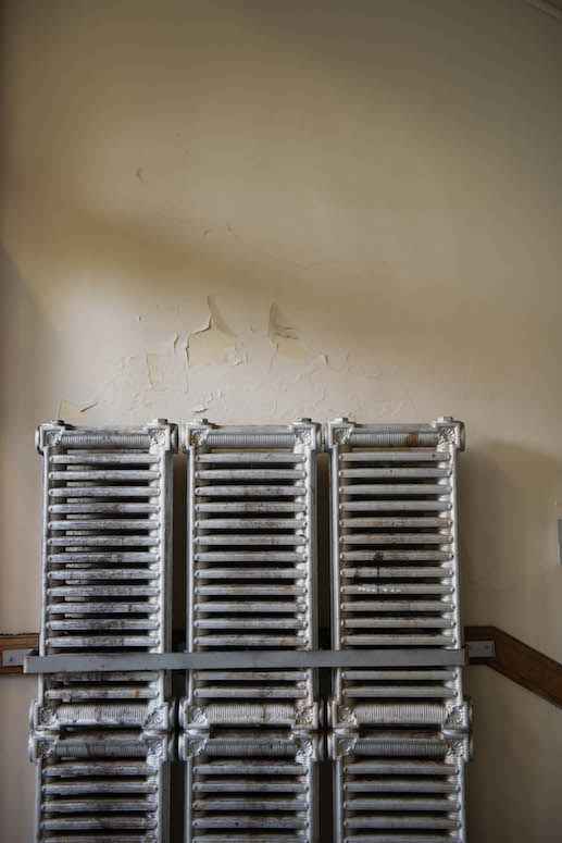 Steam radiators and peeling plaster are a common sight at Muskegon City School District.