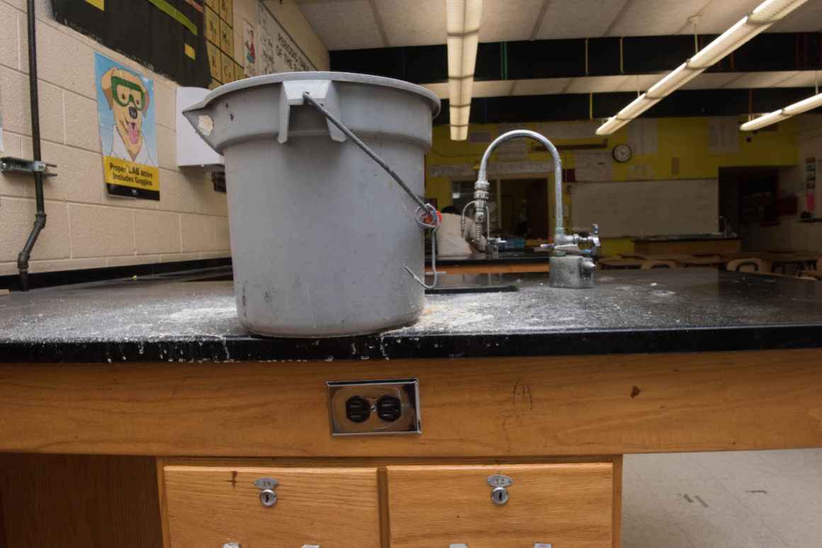 In the high-school chemistry lab at Rudyard, a roof leak has rendered one of the lab stations unusable.