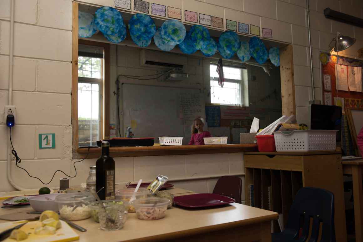 Once used as the kitchen at the school, this space is now used to hold a combined kindergarten/first grade class. Every space at The River School is of value. It is still used as a kitchen to cater select events.