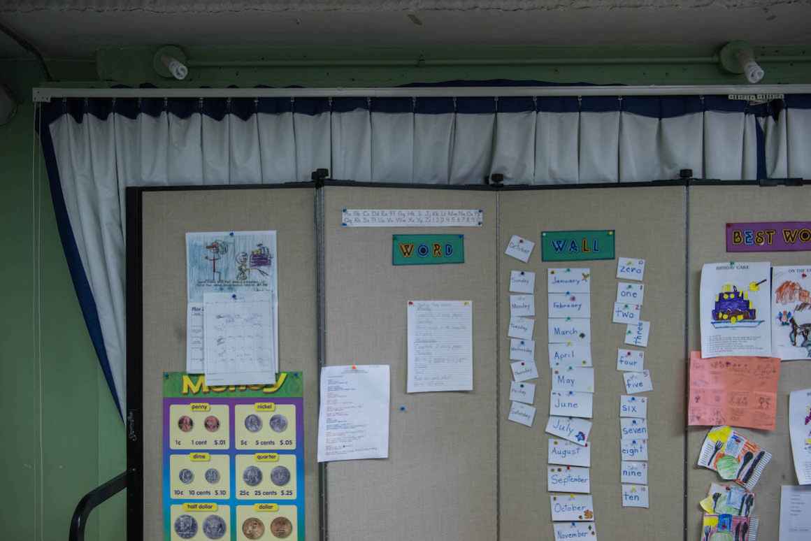 A teacher's "Word Wall," in the special-education classroom in the Sodus schoolhouse, sits on the stage unless there's a school production. The entire classroom must be disassembled when school productions take place.