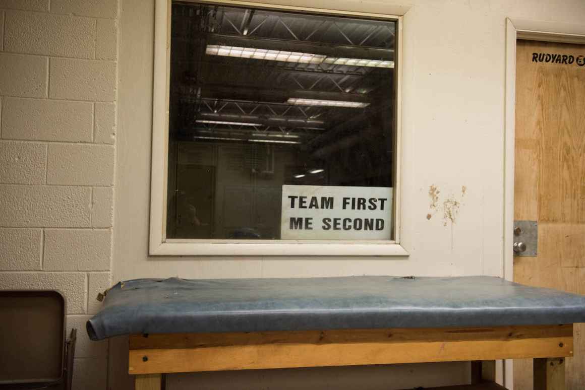 An aging trainer's table sits near the high-school boys' locker room inside the Rudyard school. The entire locker area is in desperate need of renovation.