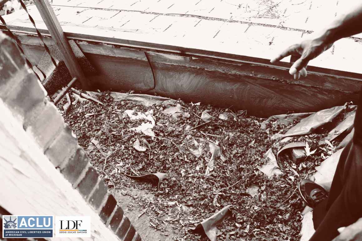 Walter Hicks points to rot on his upper balcony