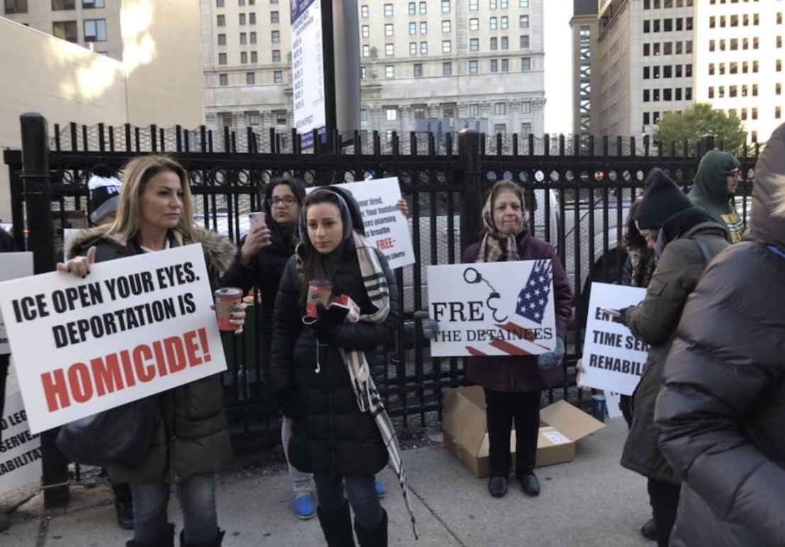 protesters outside U.S. District Court on the day of Iraqi deportation case hearing