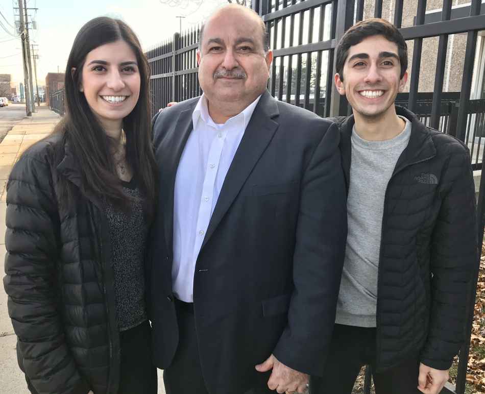 Sam Hamama standing with his daughter and son