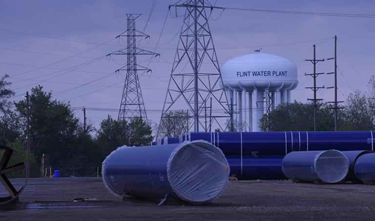 Wide picture of Flint water tower and plant