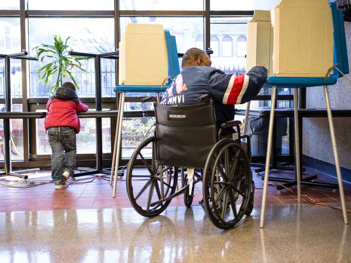 Community member casting their ballot