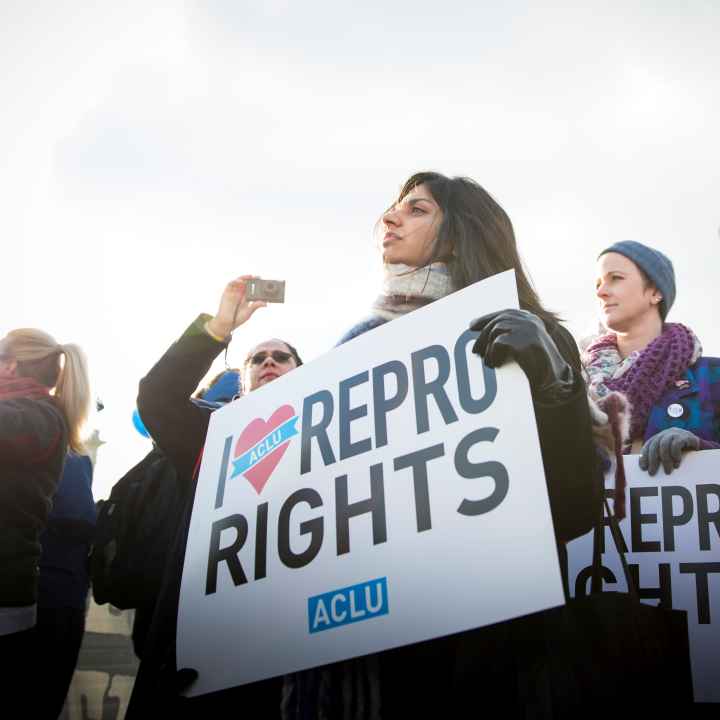 Activist protesting for reproductive rights at the Supreme Court