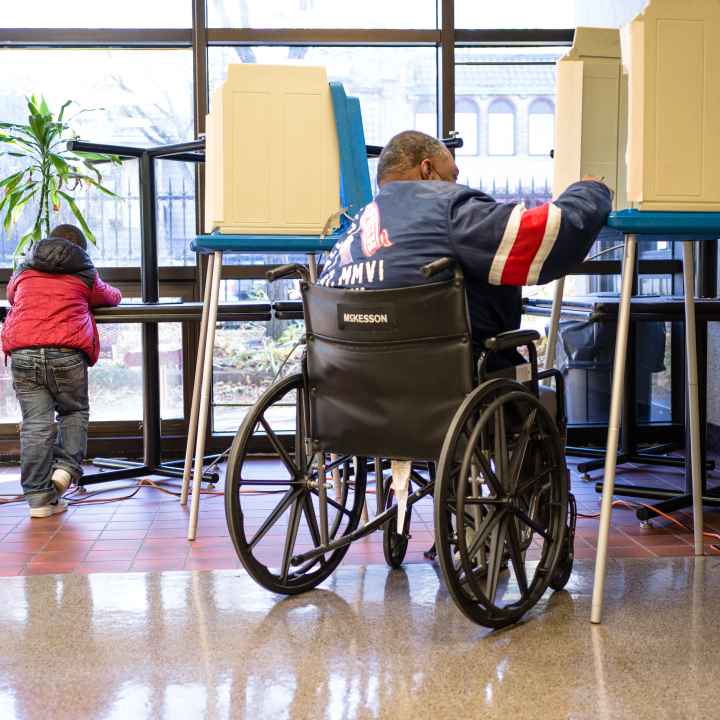 Community member casting their ballot