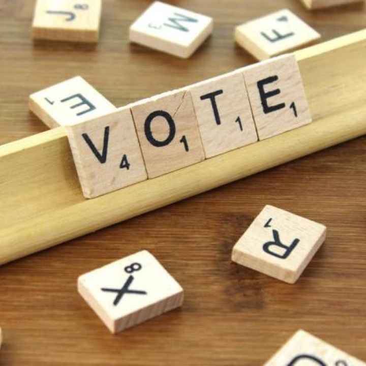 vote spelled with game tiles