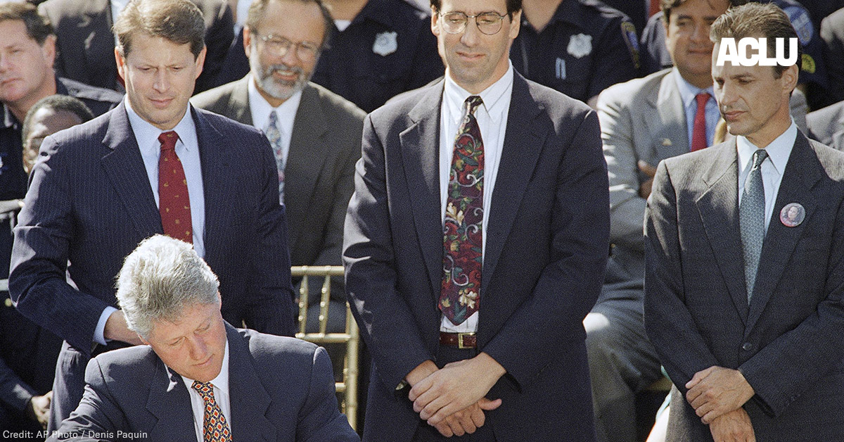 President Bill Clinton signs the $30 billion crime bill during a ceremony on the South Lawn of the White House in Washington on Sept. 13, 1994